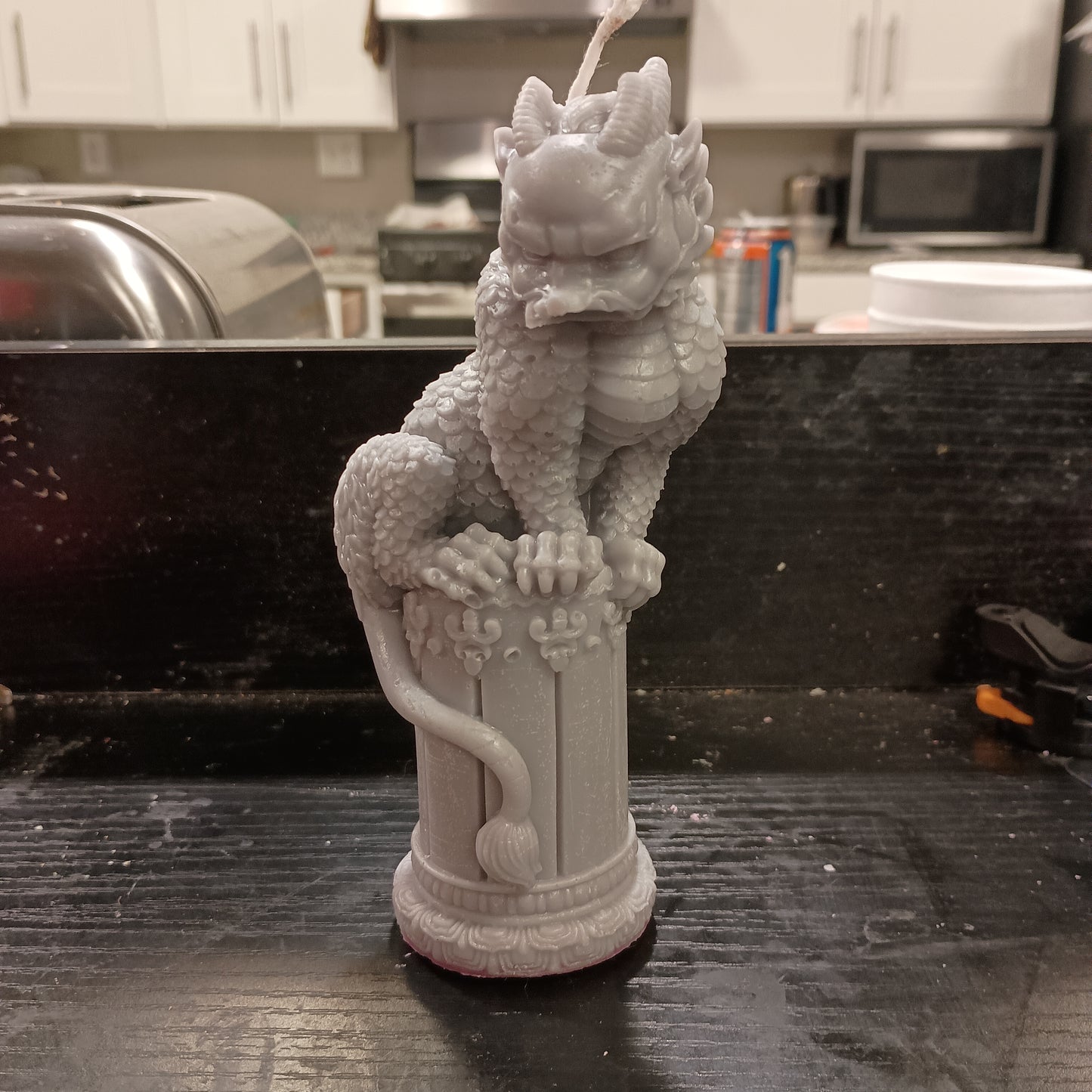 Dragon on statue candle