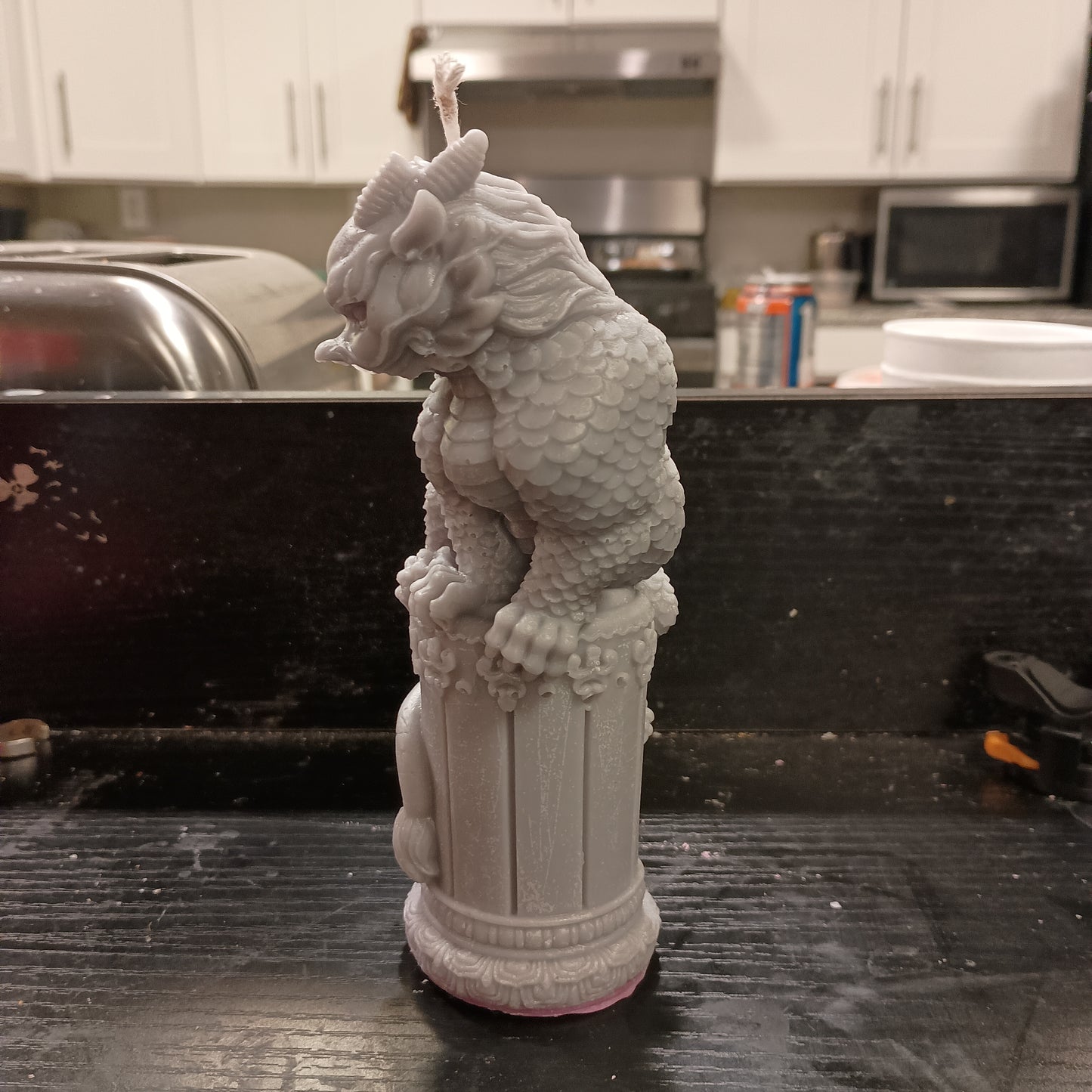 Dragon on statue candle