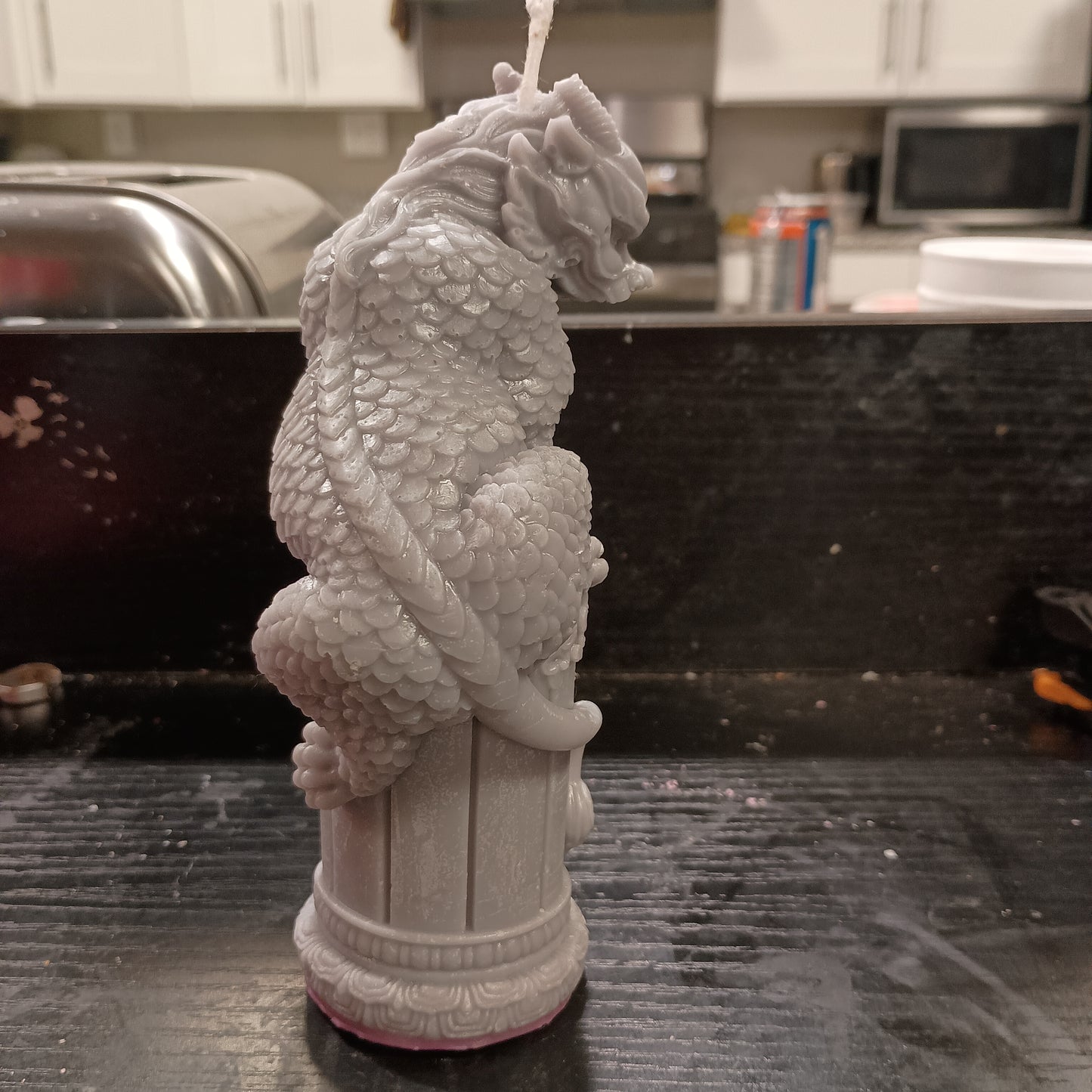 Dragon on statue candle