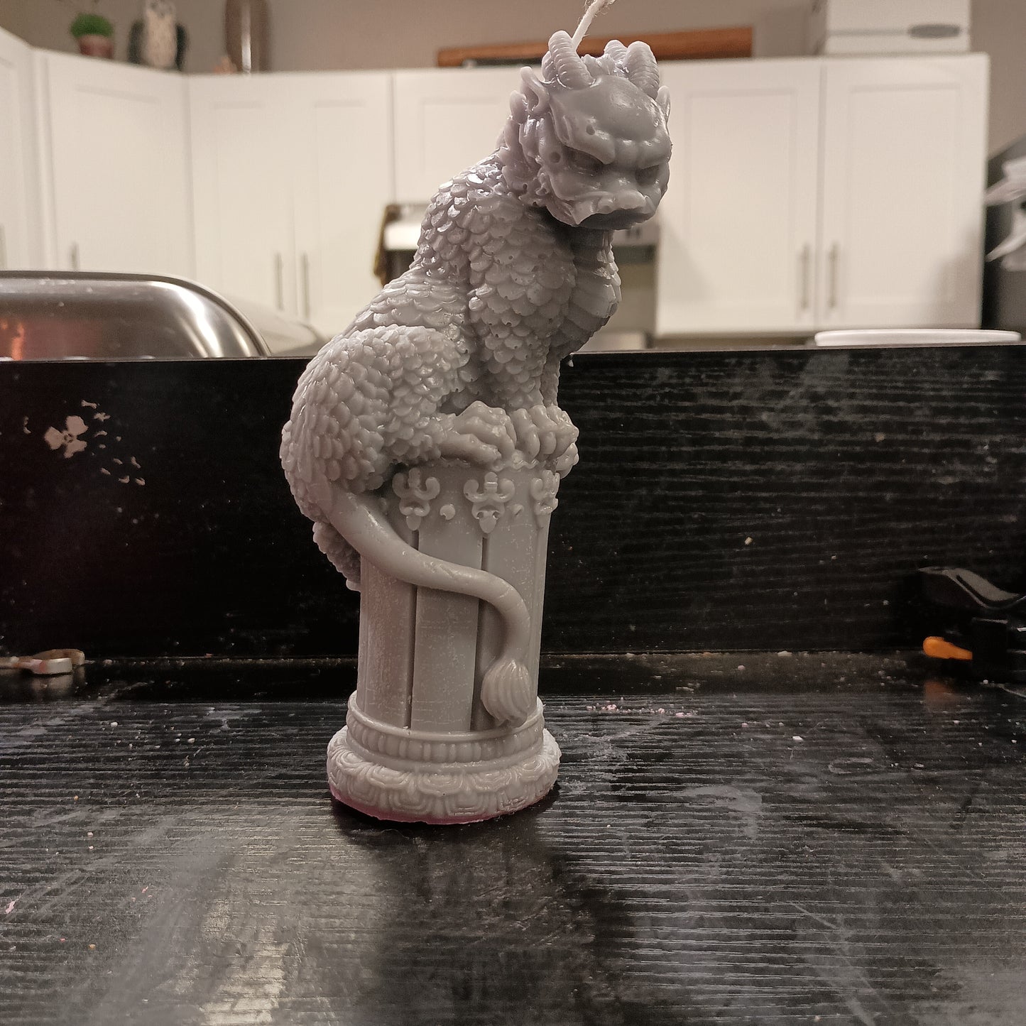 Dragon on statue candle