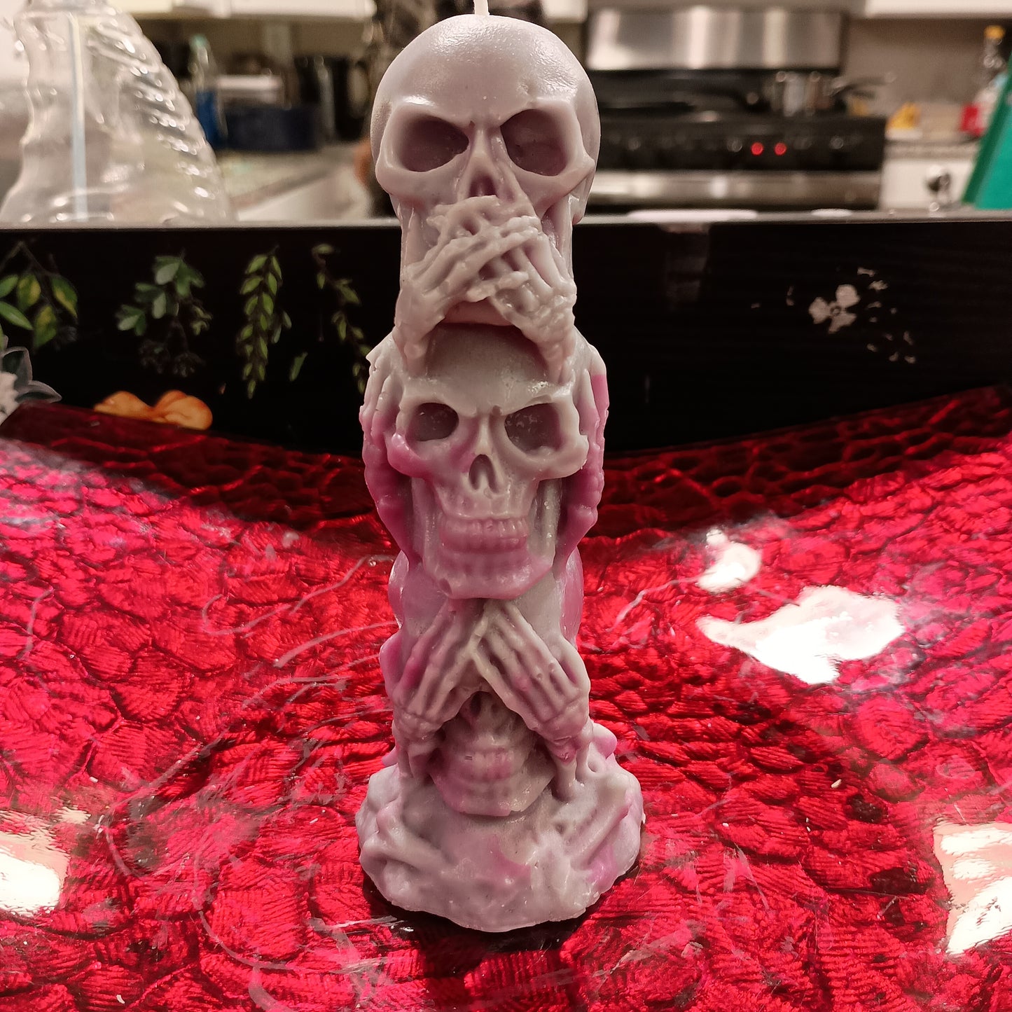 Tower of skulls candle