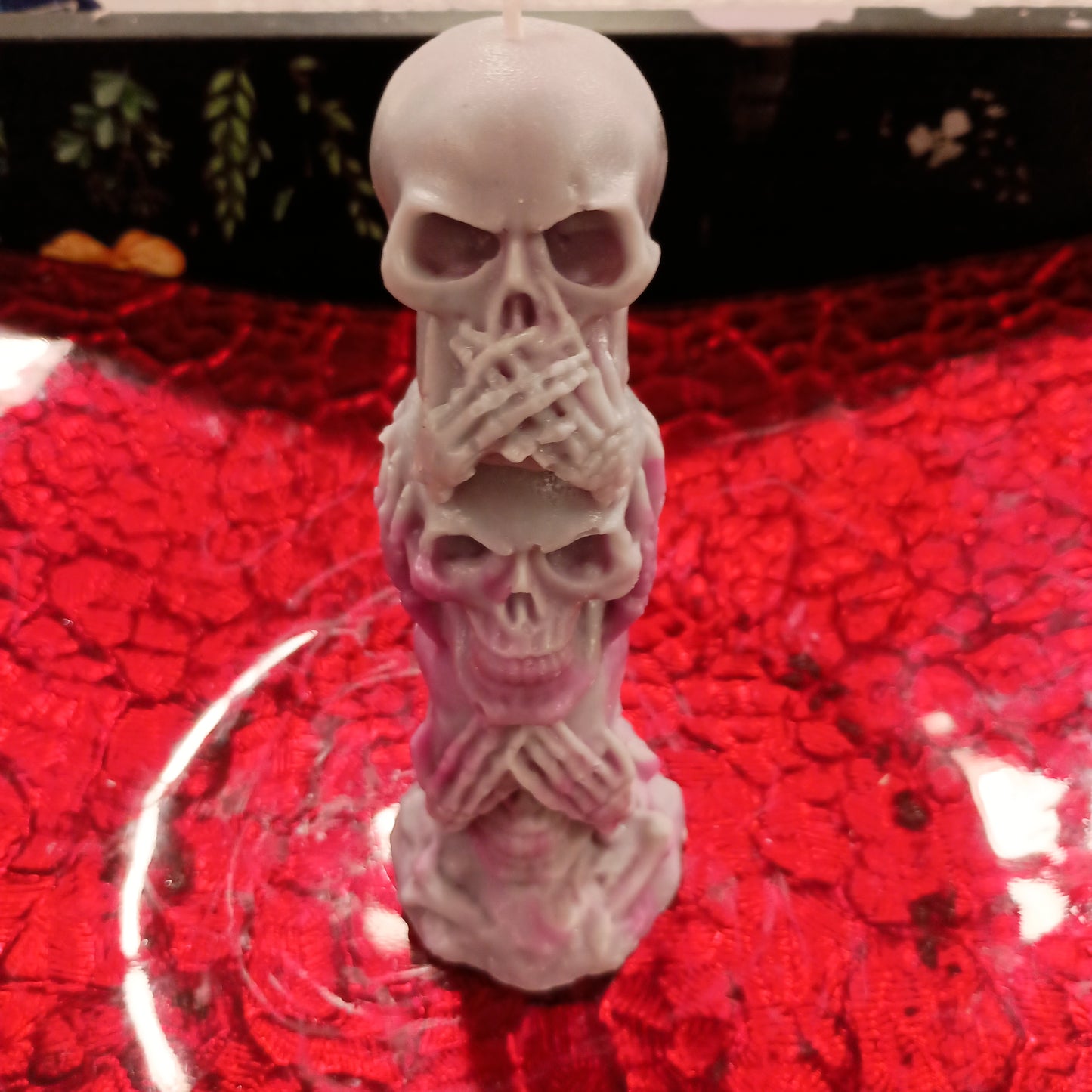 Tower of skulls candle