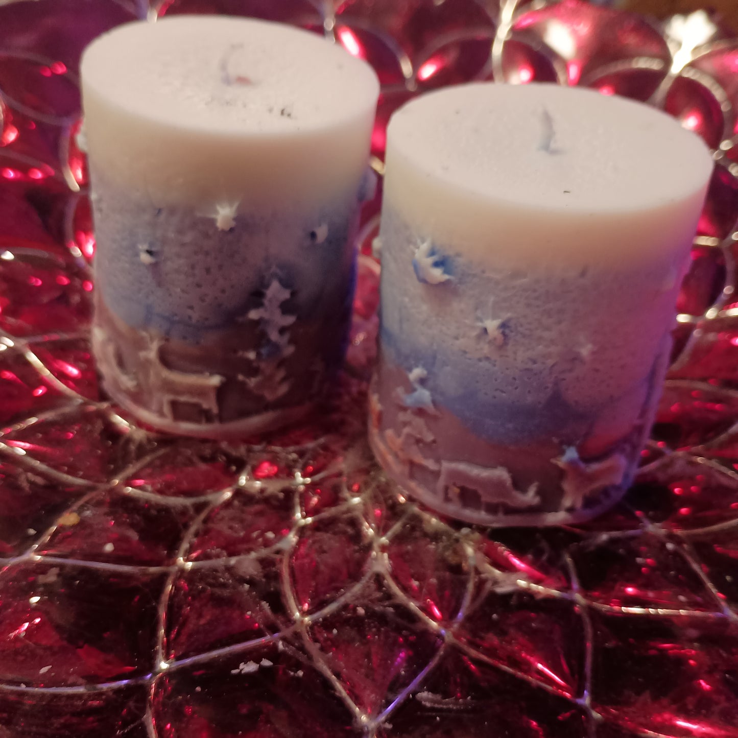 Pair of Red white and blue holiday piller candles