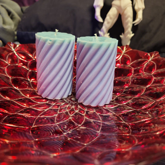 Pair of blue small piller scented candles