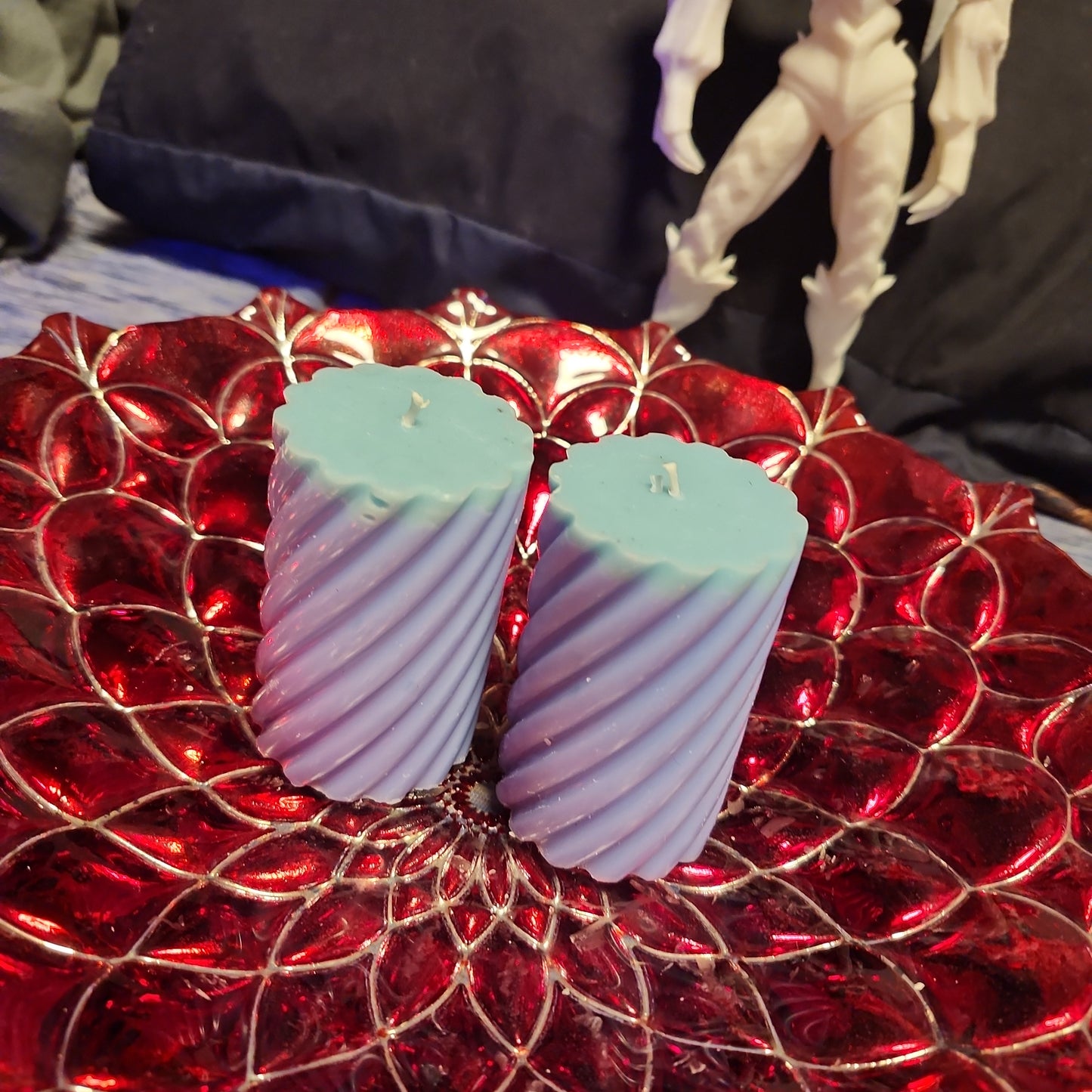 Pair of blue small piller scented candles