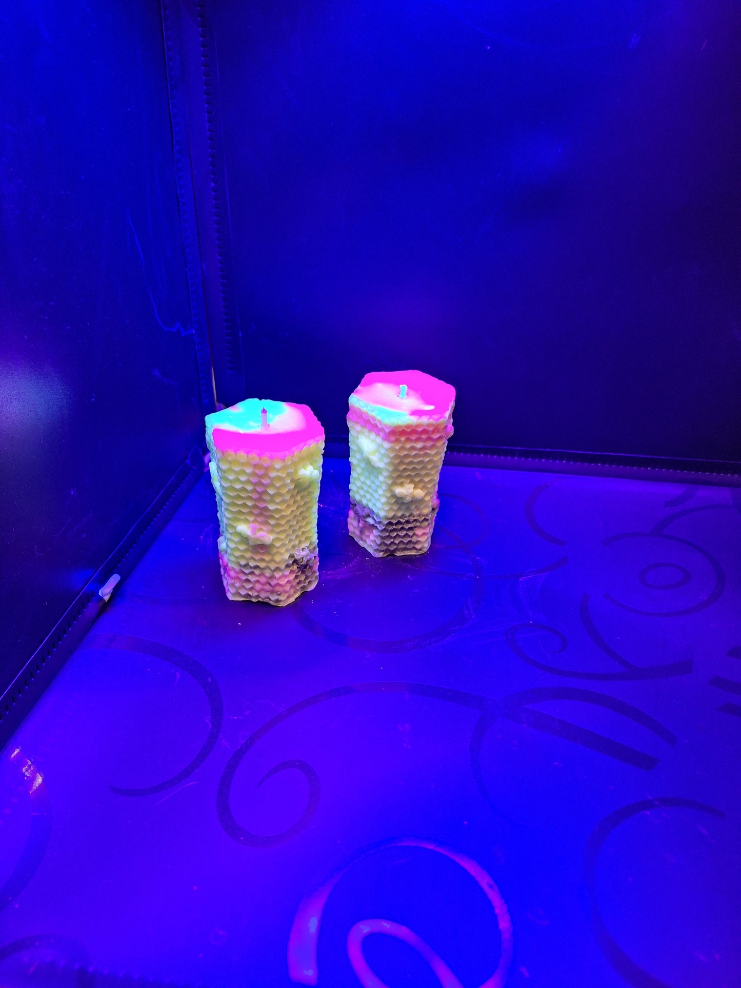 Blacklight pair of bee hive piller candles scented