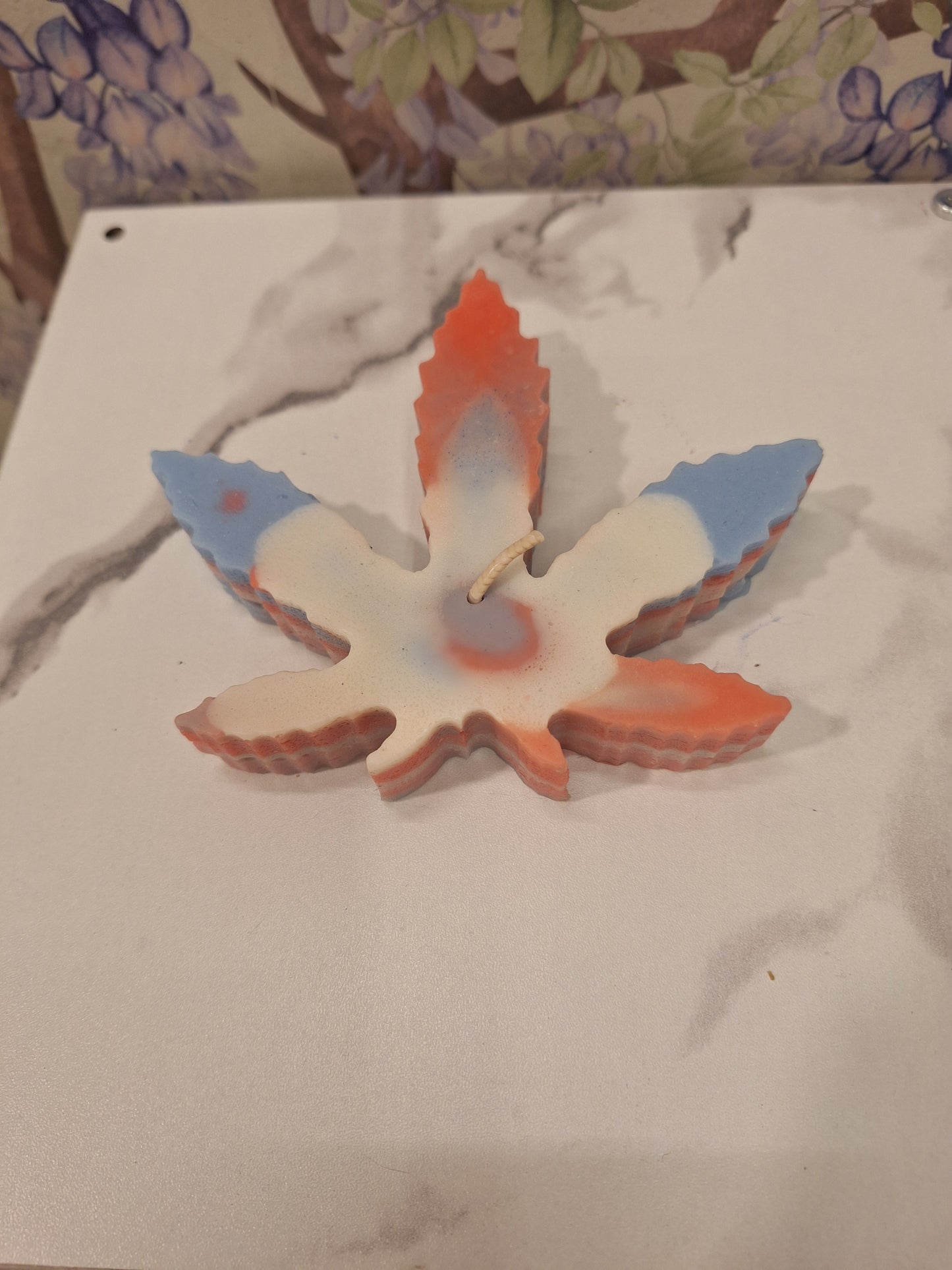 Large red white and blue pot leaf scented candle