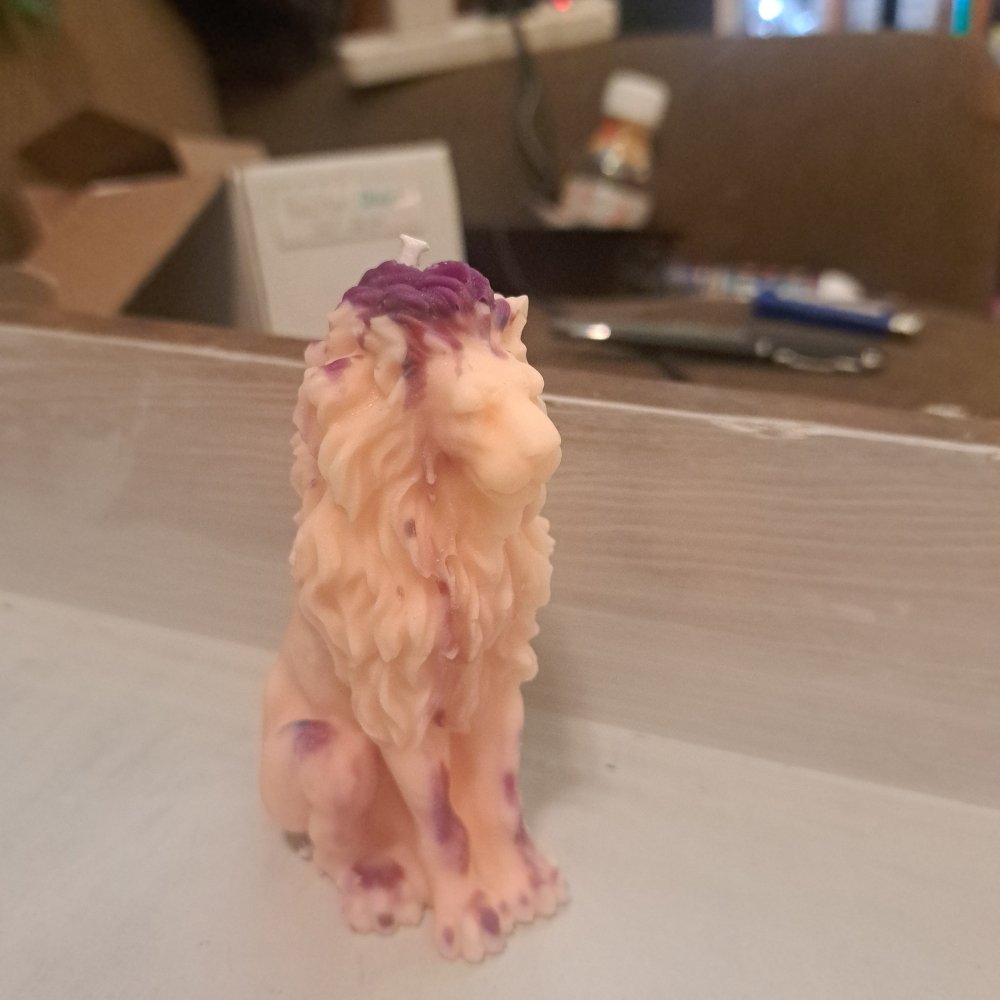 Orange and purple sitting lion scented candle9