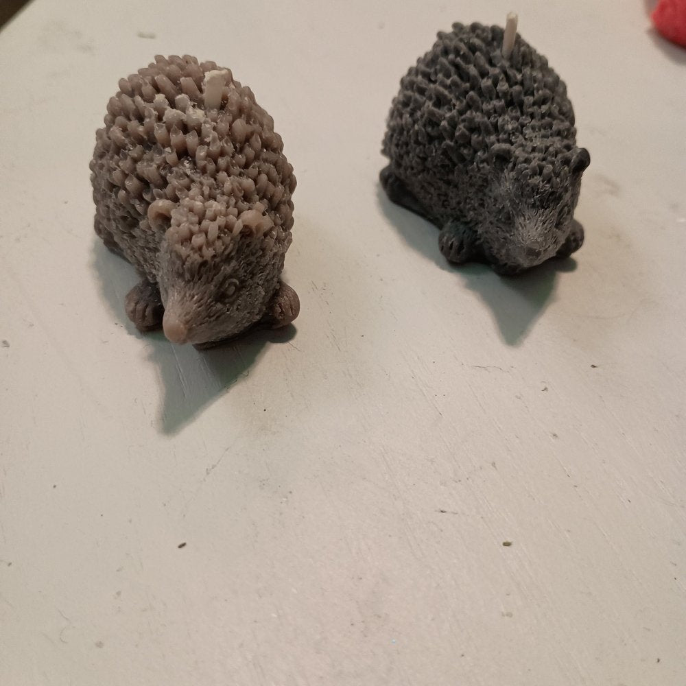 Pair of black hedgehog scented candles6