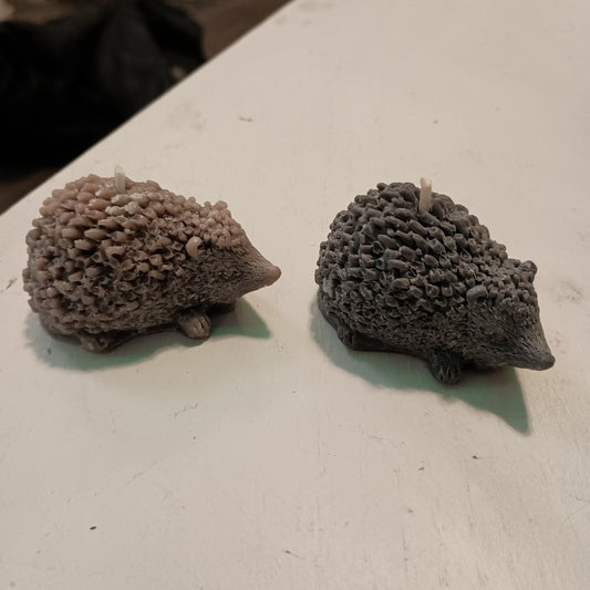 Pair of black hedgehog scented candles6