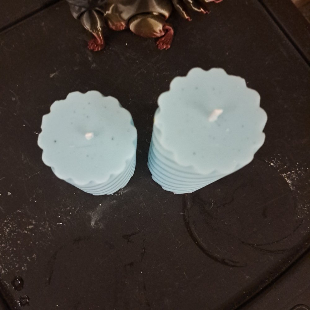 Pair of blue scented piller candles *designed*13