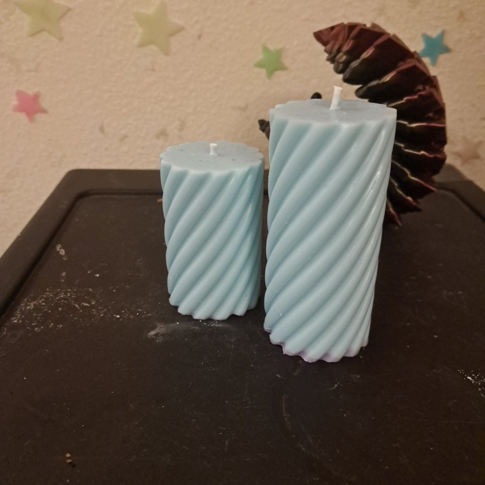 Pair of blue scented piller candles *designed*13