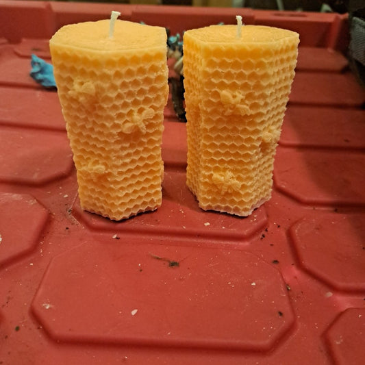 Pair of orange piller scented bee Hive candles16