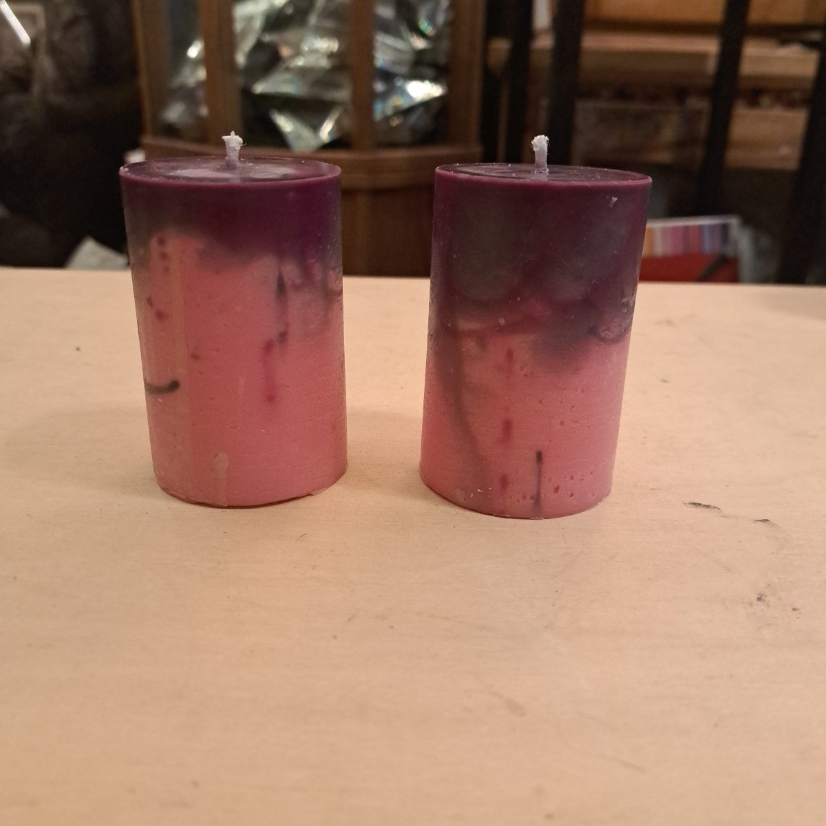 Pair of Pink and purple small scented piller candles10