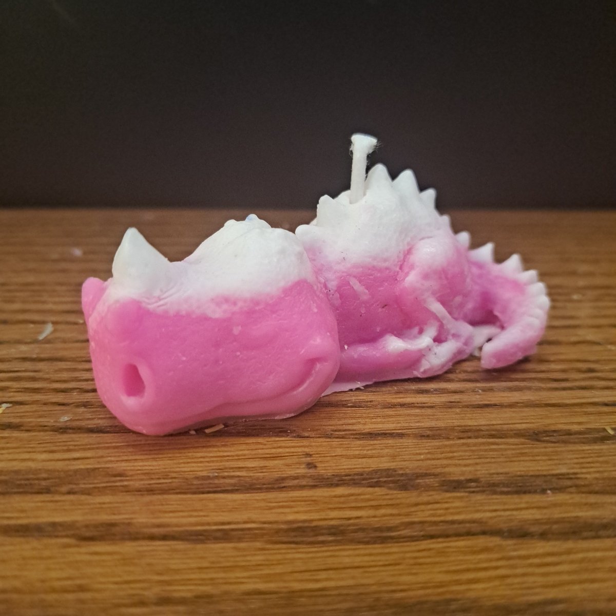 Pink and white sleeping dino scented candle5