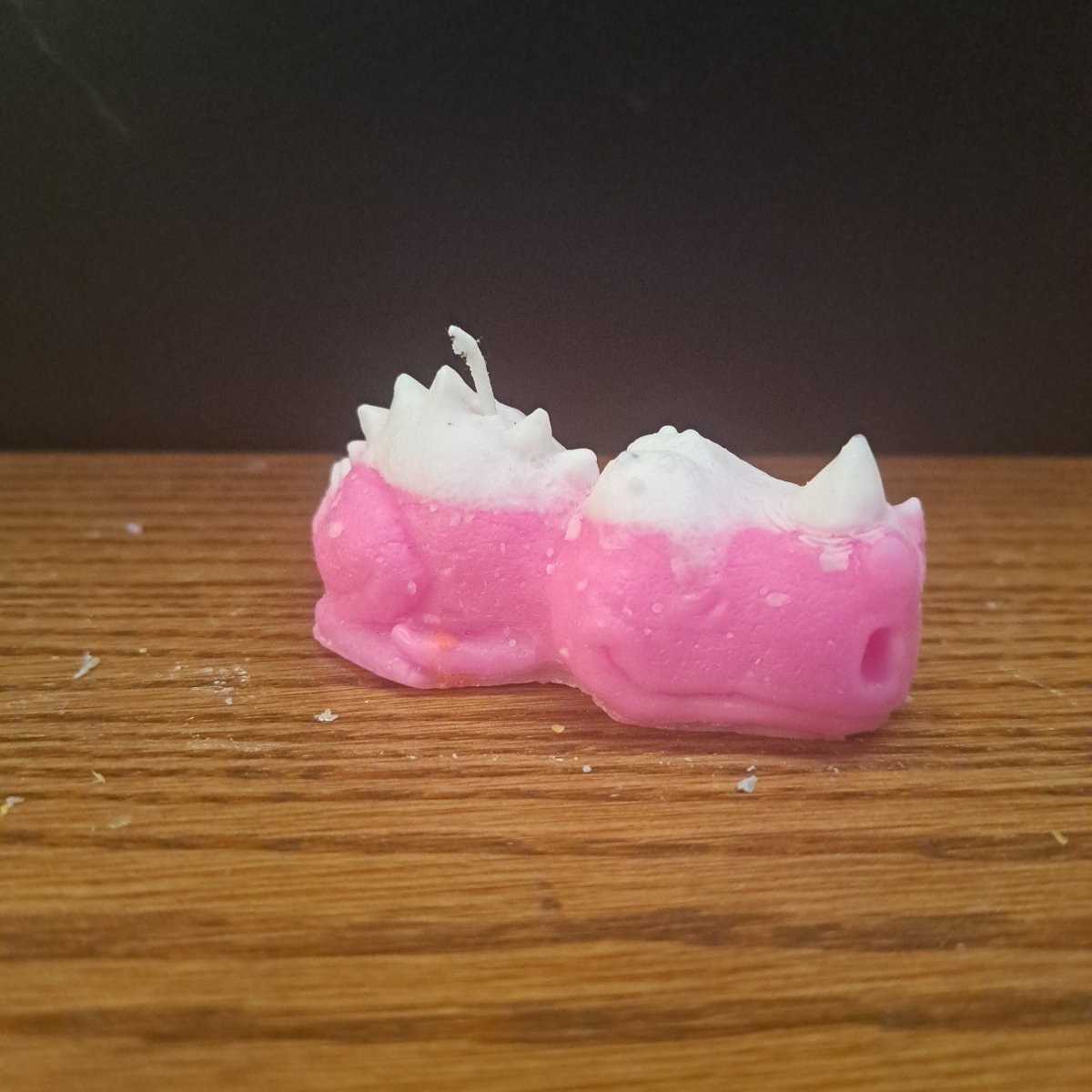 Pink and white sleeping dino scented candle5