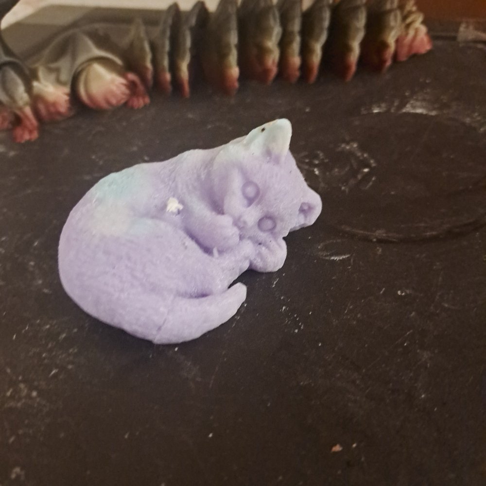 Purple laying kitty scented candle6