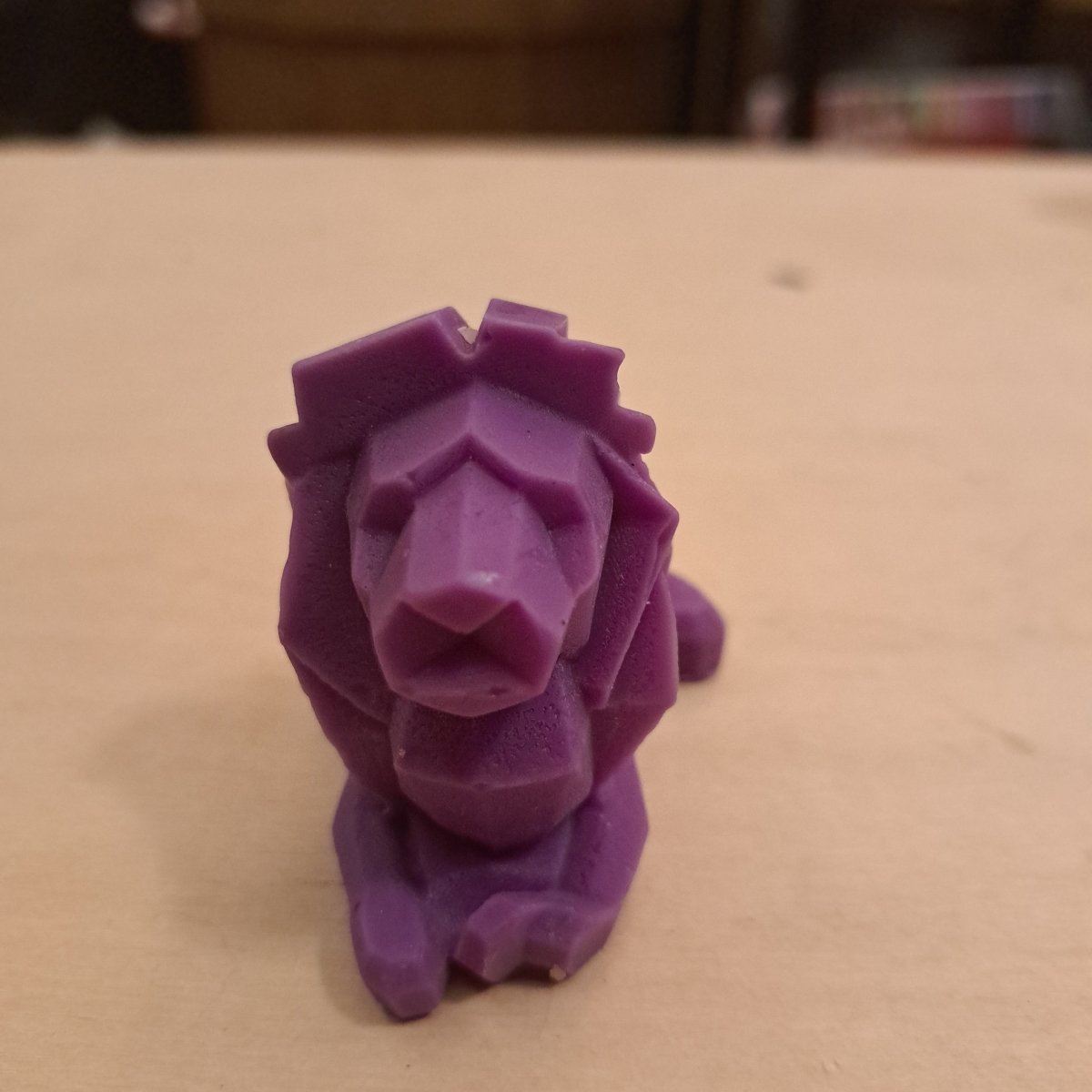 Purple laying lion scented candle5