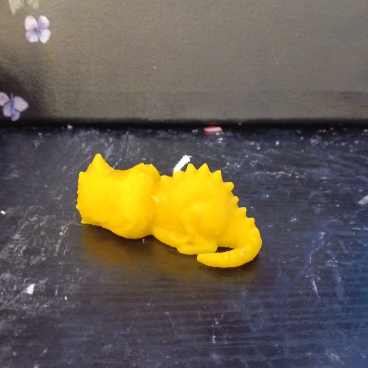 YELLOW sleeping dino scented candle6